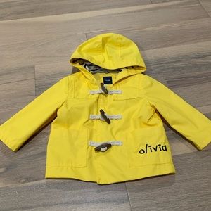 Baby GAP Rain Coat size 12-18 months. It has the name Olivia embroidered